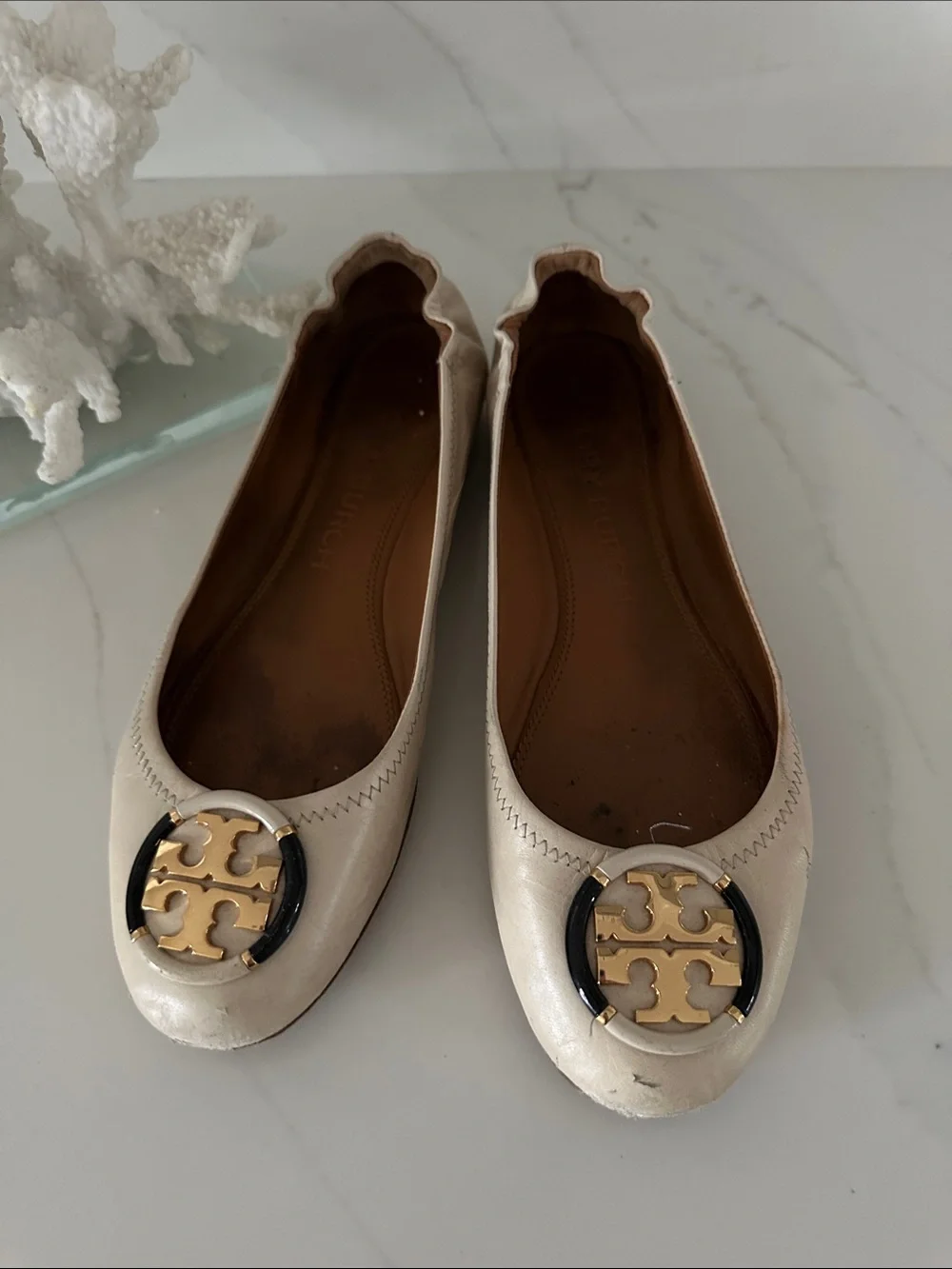 Tory Burch Cream Leather Logo Ballet Flats with Black & Gold Emblem